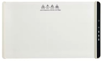 Electric food warming mat with a neutral surface and black side control panel